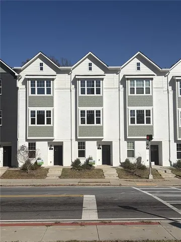 a front view of residential houses