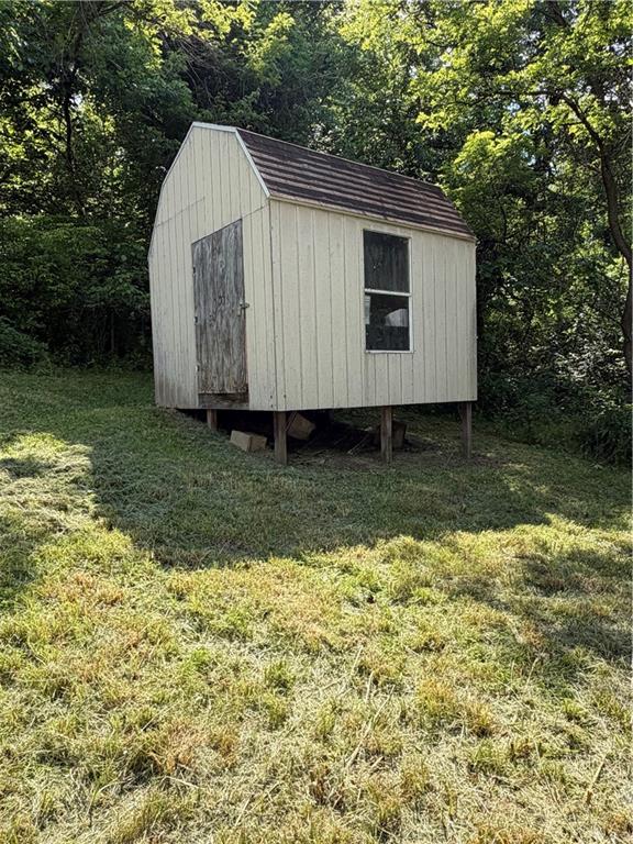 55 Pumpkin Center Road Finleyville, PA 15332 - Photo 26 of 29 a view of a backyard with a garden and entertaining space