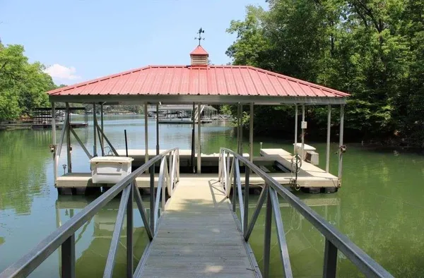 a patio with table and chairs
