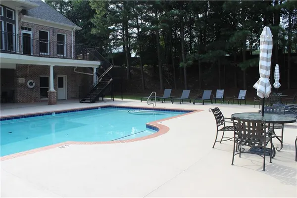 a wooden bench sitting in the middle of a park