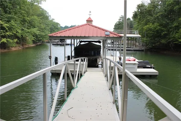 a view of a lake with a deck