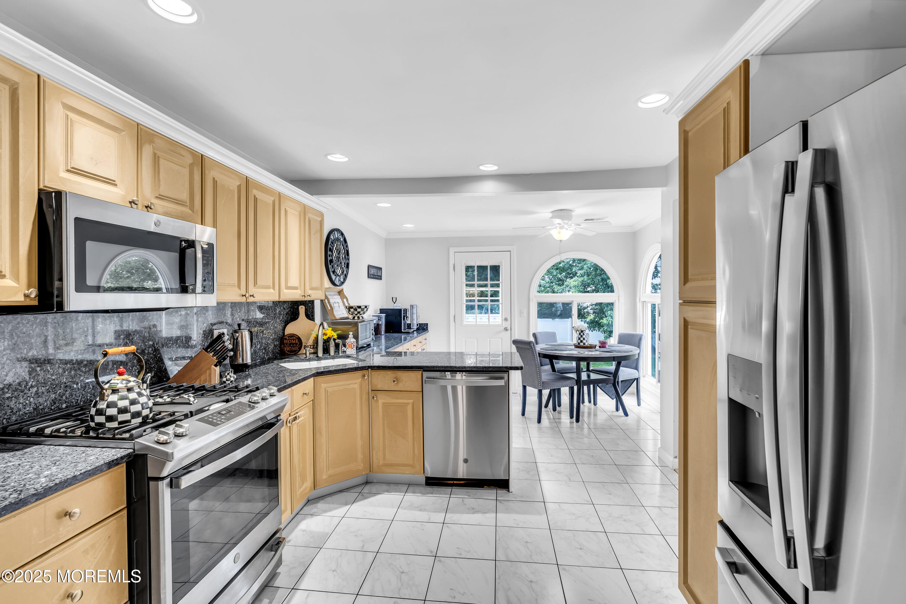 15 Windsor Road Howell, NJ 07731 - Photo 11 of 46 a kitchen with a sink stainless steel appliances and cabinets