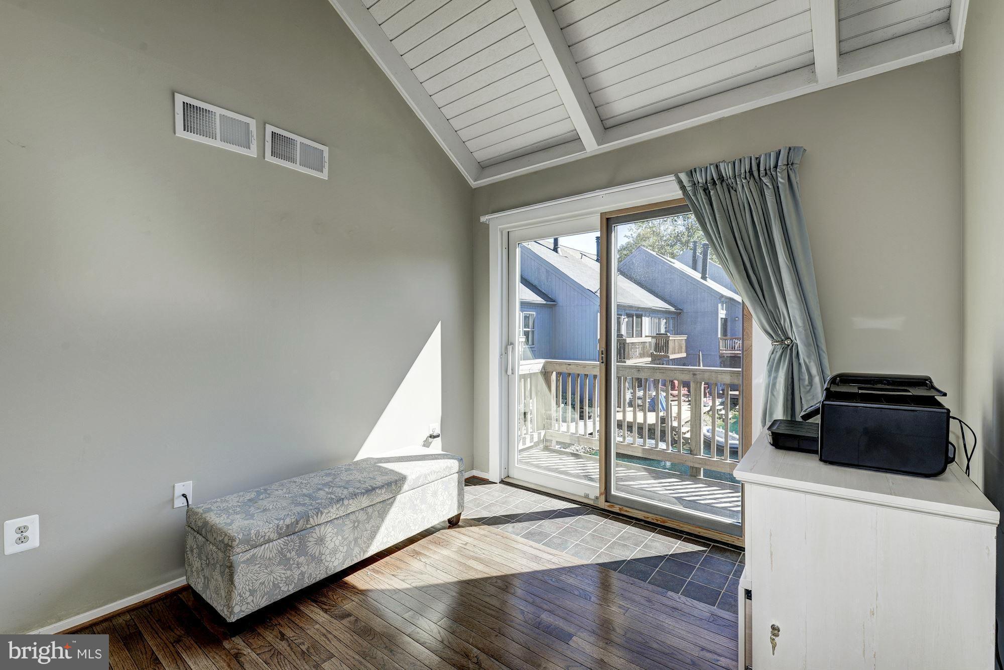 11141 Timberhead Court Reston, VA 20191 - Photo 16 of 30 Bedroom with private balcony overlooks pond
