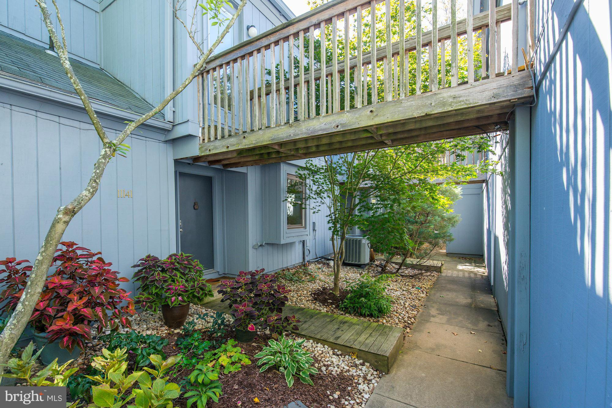 11141 Timberhead Court Reston, VA 20191 - Photo 3 of 30 Front entrance with catwalk to loft over garage