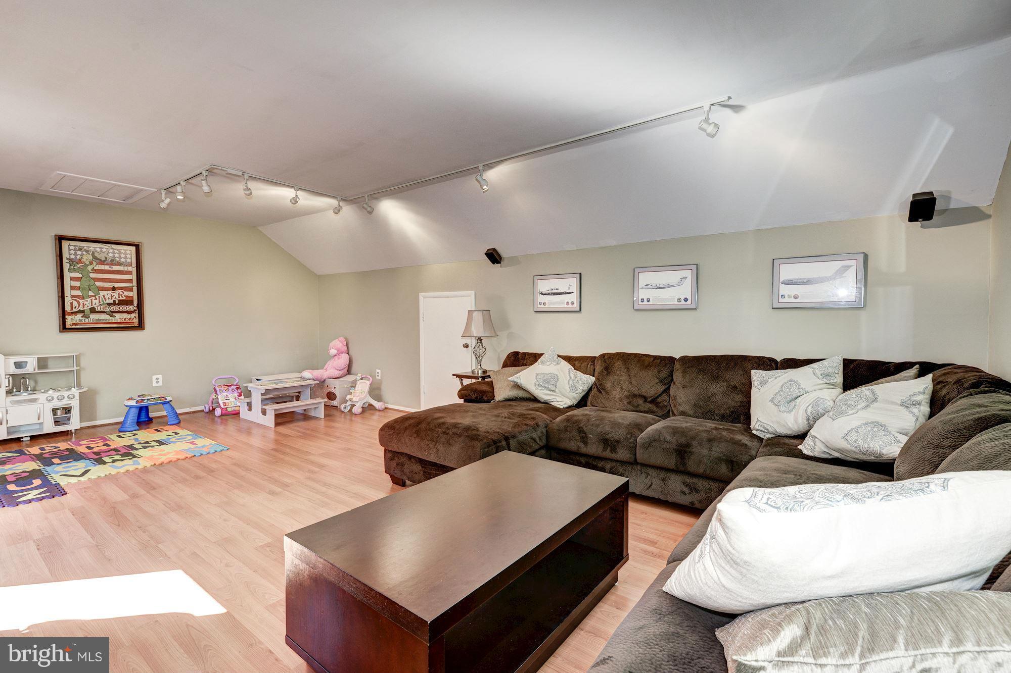 11141 Timberhead Court Reston, VA 20191 - Photo 26 of 30 Finished loft with plenty of concealed storage