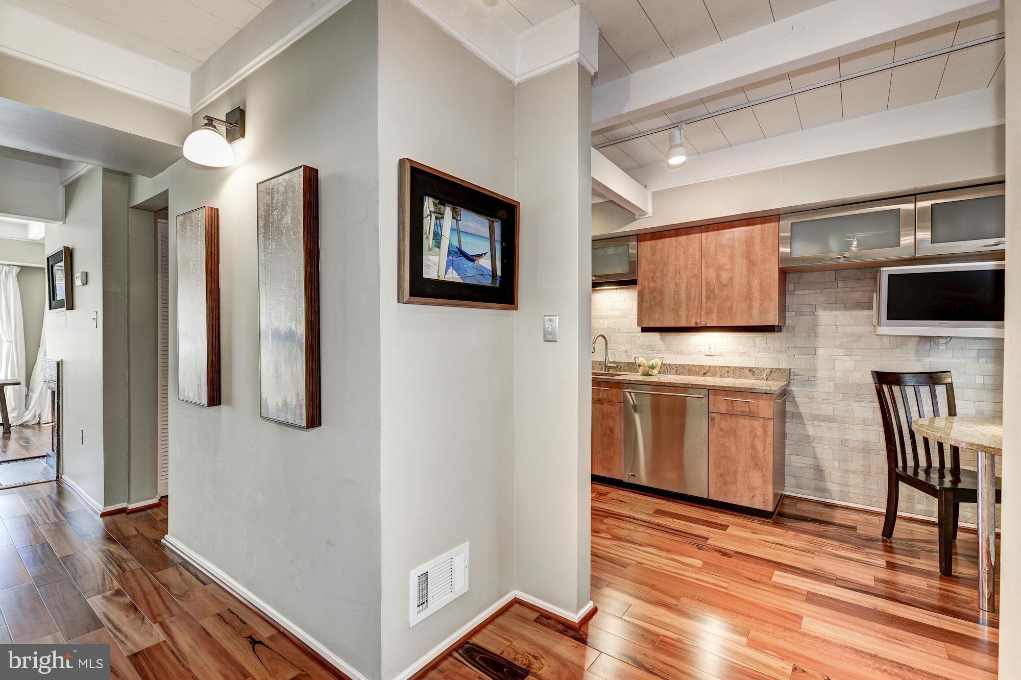 11141 Timberhead Court Reston, VA 20191 - Photo 4 of 30 Foyer opens to kitchen and half bath