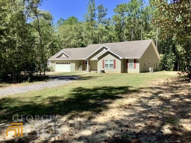40446 Rosemary Church Road Metter, GA 30439 - Photo 1 of 1 a front view of a house with a yard