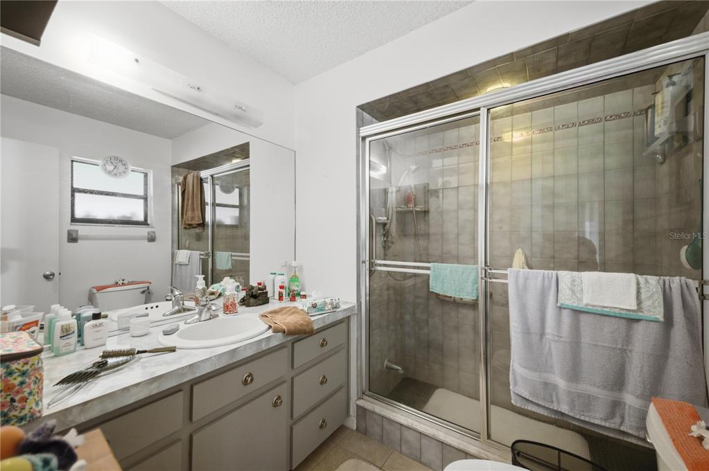 3455 Southwest 19th Street Ocala, FL 34474 - Photo 12 of 17 a bathroom with a double vanity sink and mirror