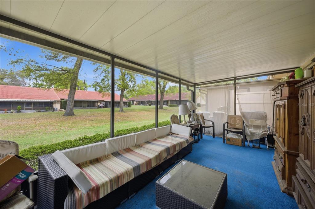 3455 Southwest 19th Street Ocala, FL 34474 - Photo 17 of 17 a living room with furniture and a floor to ceiling window