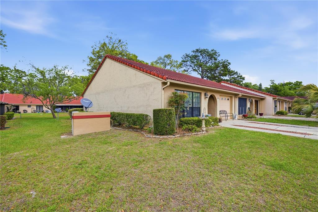 3455 Southwest 19th Street Ocala, FL 34474 - Photo 3 of 17 a view of a house with backyard and sitting area