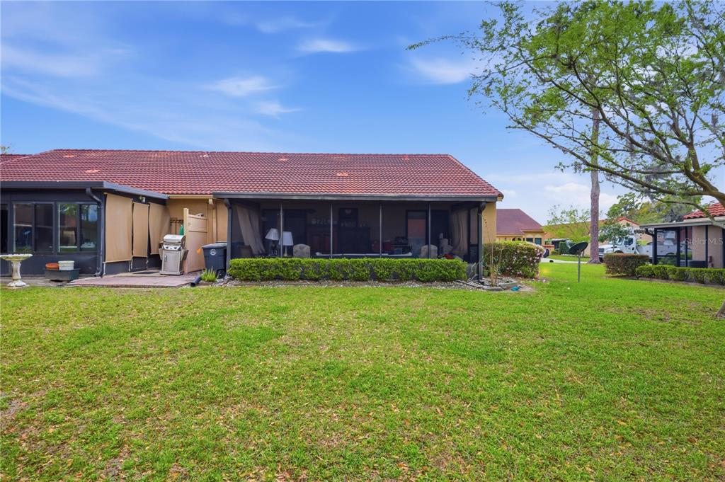 3455 Southwest 19th Street Ocala, FL 34474 - Photo 5 of 17 a front view of a house with a yard