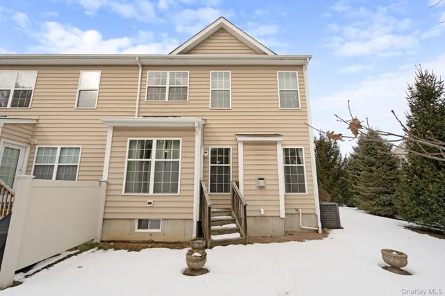 a view of a room with wooden walls