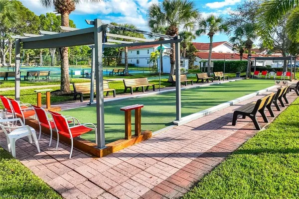 a view of park with sitting area