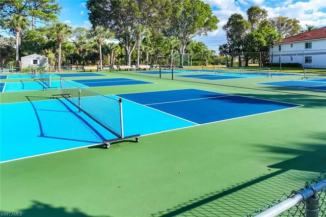 a view of a golf course with a park