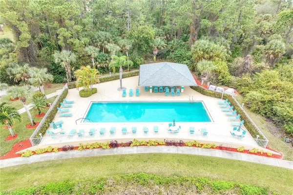a view of a swimming pool with an outdoor space