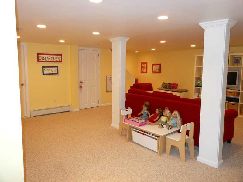 2 Griffith Road Riverside, CT 06878 - Photo 18 of 19 a living room with furniture and a refrigerator