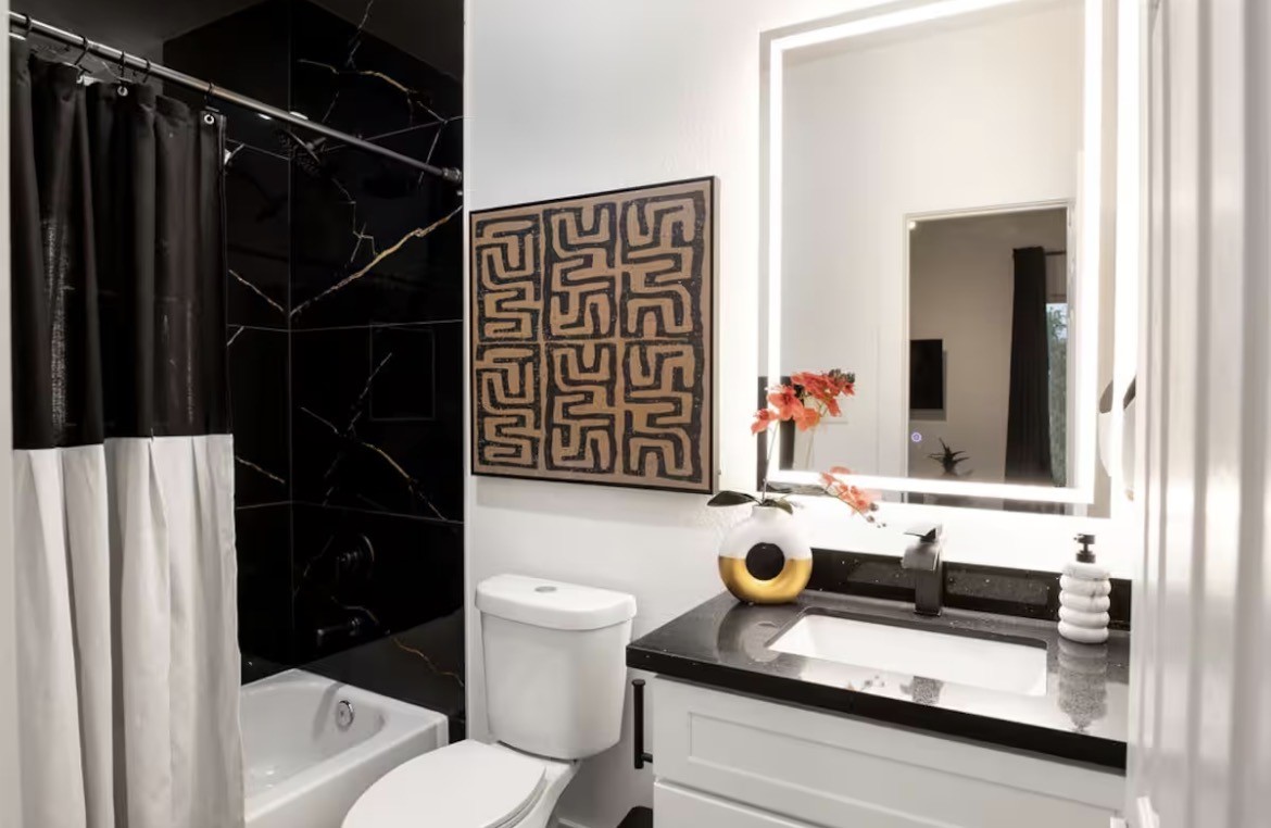 5311 Liberty Road Houston, TX 77026 - Photo 12 of 29 a bathroom with a sink toilet and shower