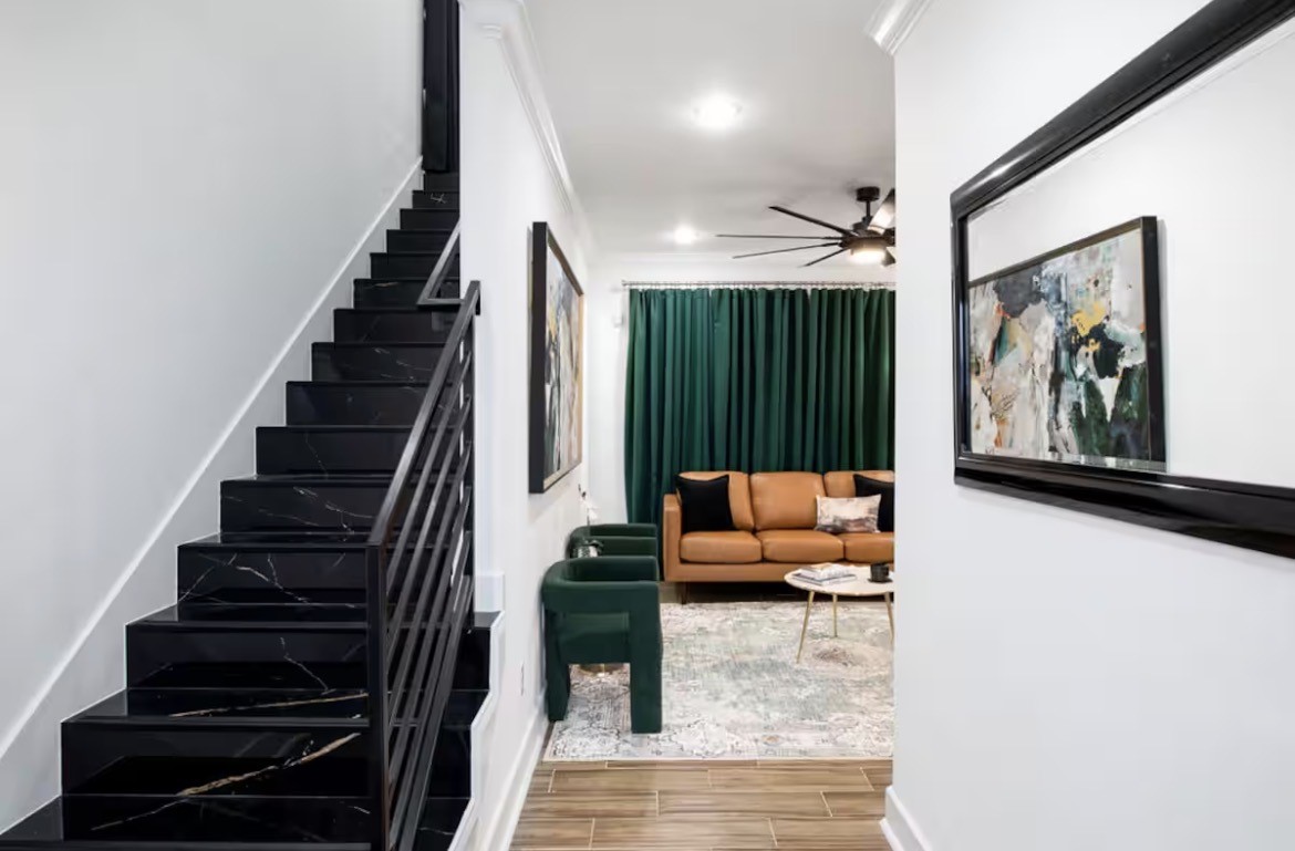 5311 Liberty Road Houston, TX 77026 - Photo 2 of 29 a living room with furniture and stairs