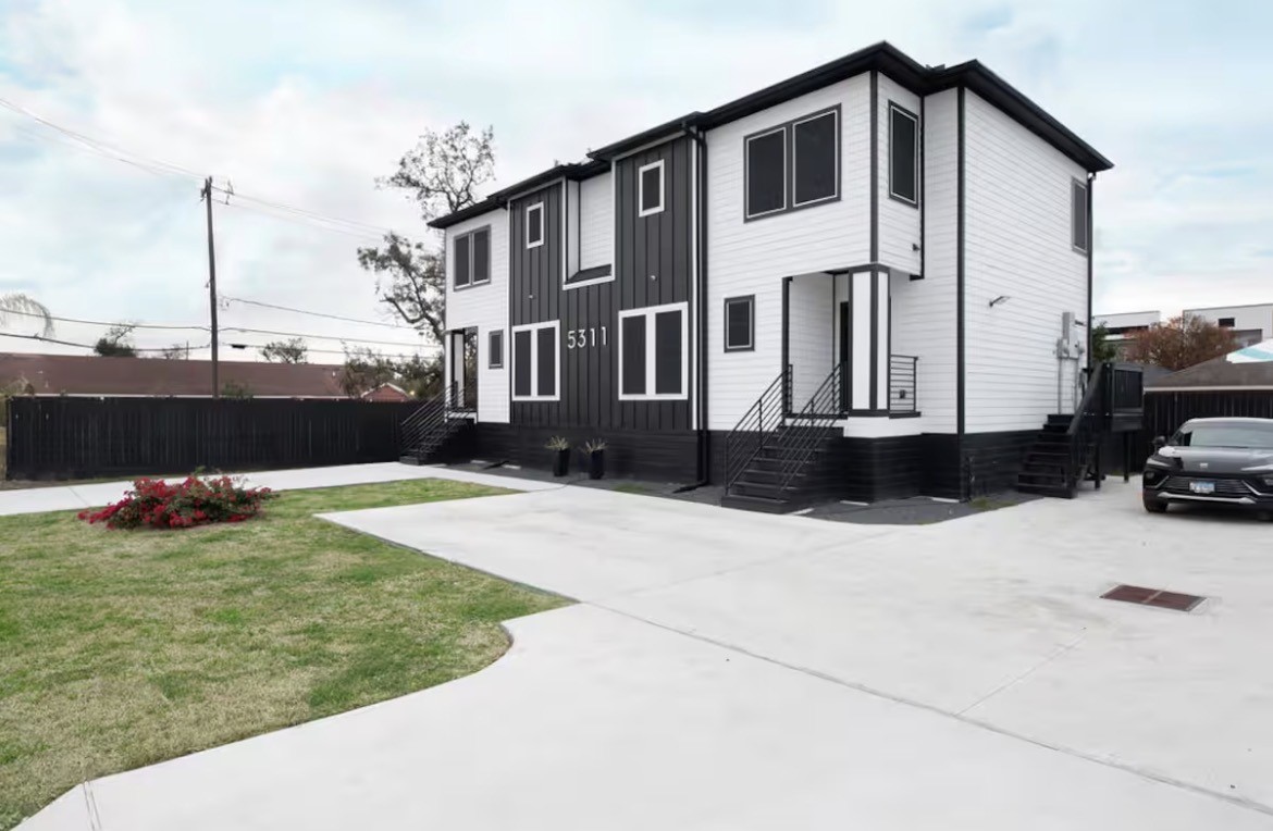 5311 Liberty Road Houston, TX 77026 - Photo 3 of 29 a front view of a house with a yard