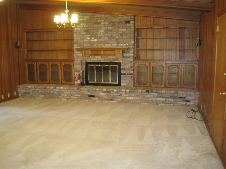1201 16th Street Ralls, TX 79357 - Photo 4 of 10 a view of a fireplace with a door