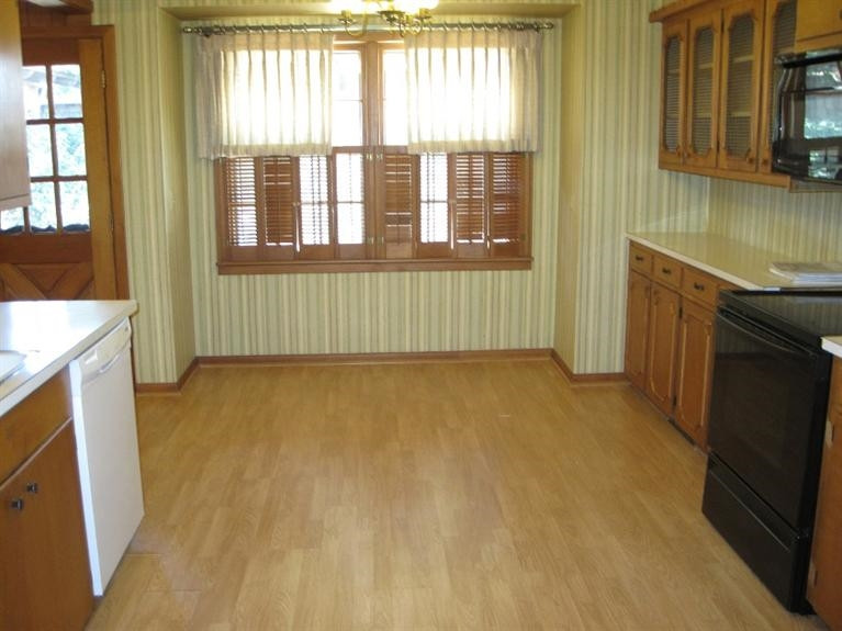 1201 16th Street Ralls, TX 79357 - Photo 7 of 10 a view of an empty room with a window
