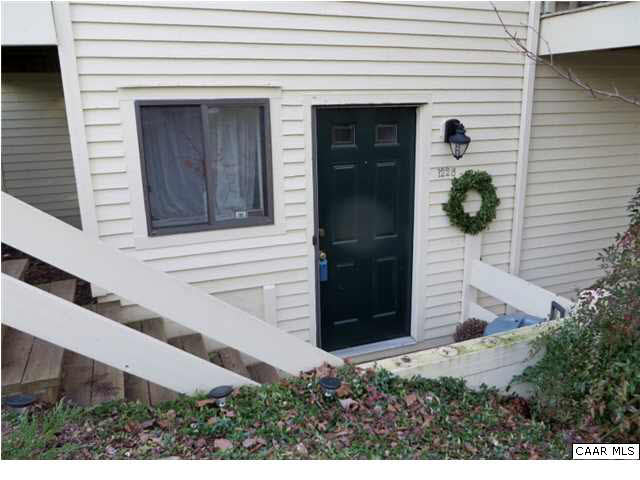 1228 Chatham Ridge Charlottesville, VA 22901 - Photo 1 of 20 a front view of a house with glass windows