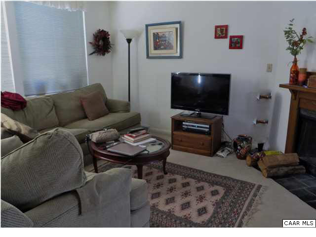 1228 Chatham Ridge Charlottesville, VA 22901 - Photo 2 of 20 a living room with furniture and a flat screen tv