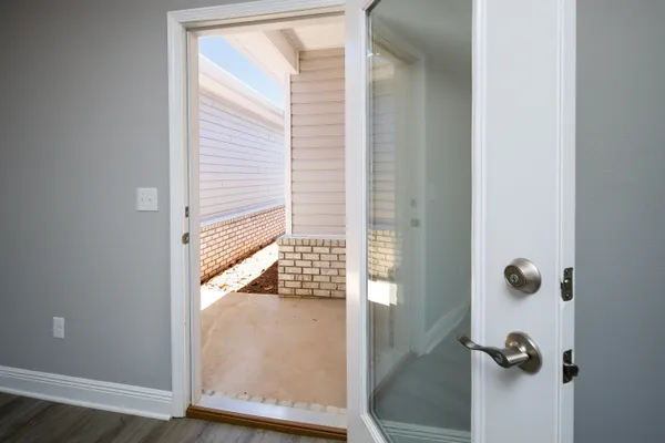 a view of a bathroom with a glass door