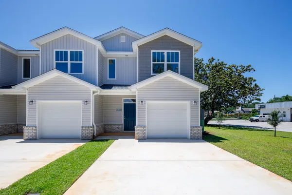 a front view of house with yard