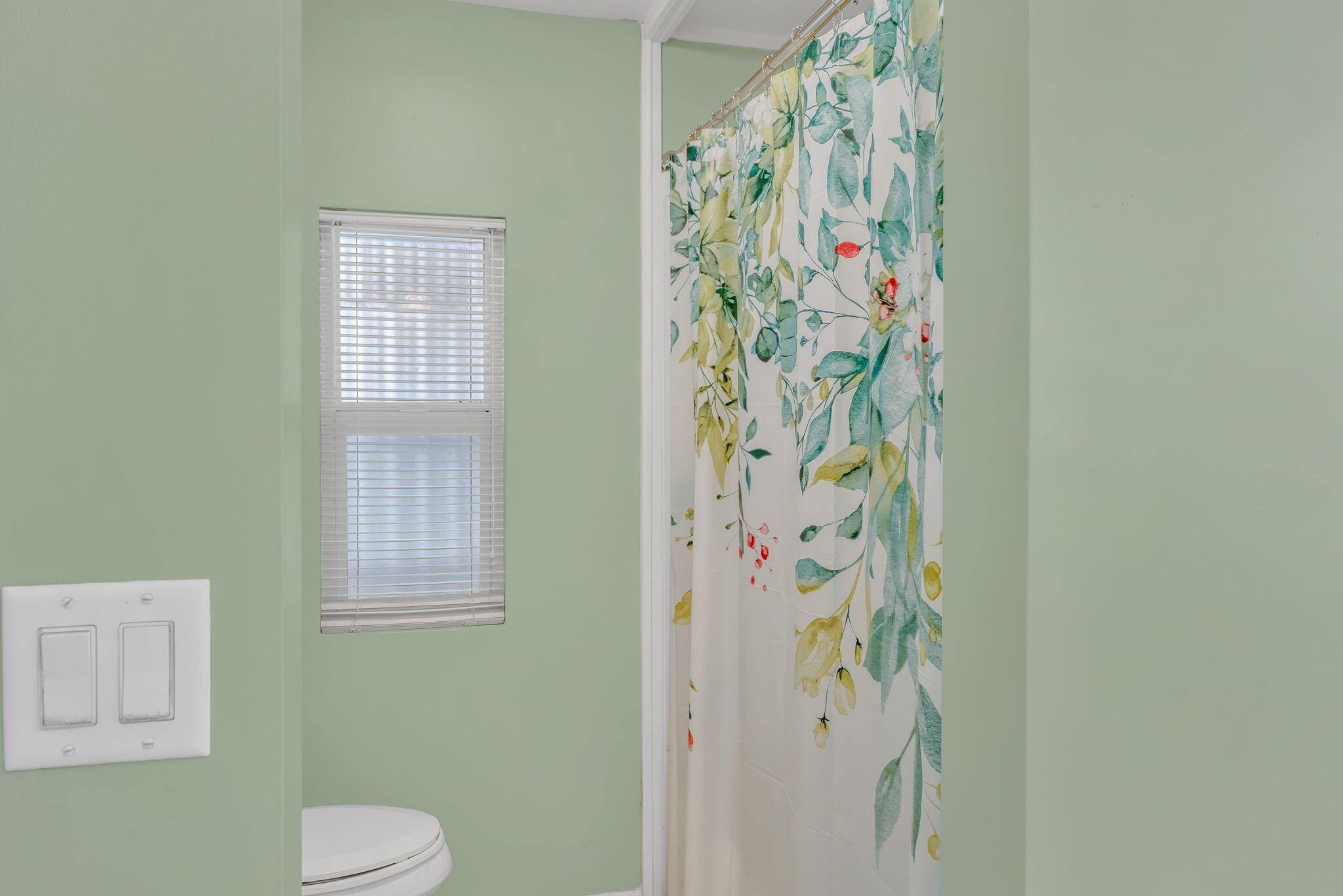 902 South Ruby Drive Key Largo, FL 33037 - Photo 25 of 44 a white toilet sitting next to a window