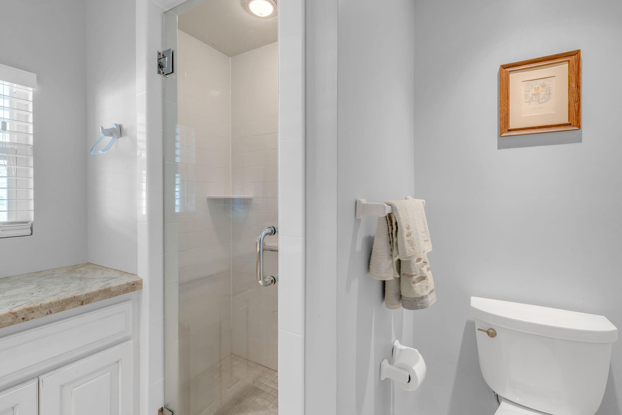 902 South Ruby Drive Key Largo, FL 33037 - Photo 28 of 44 a bathroom with a granite countertop toilet and a shower