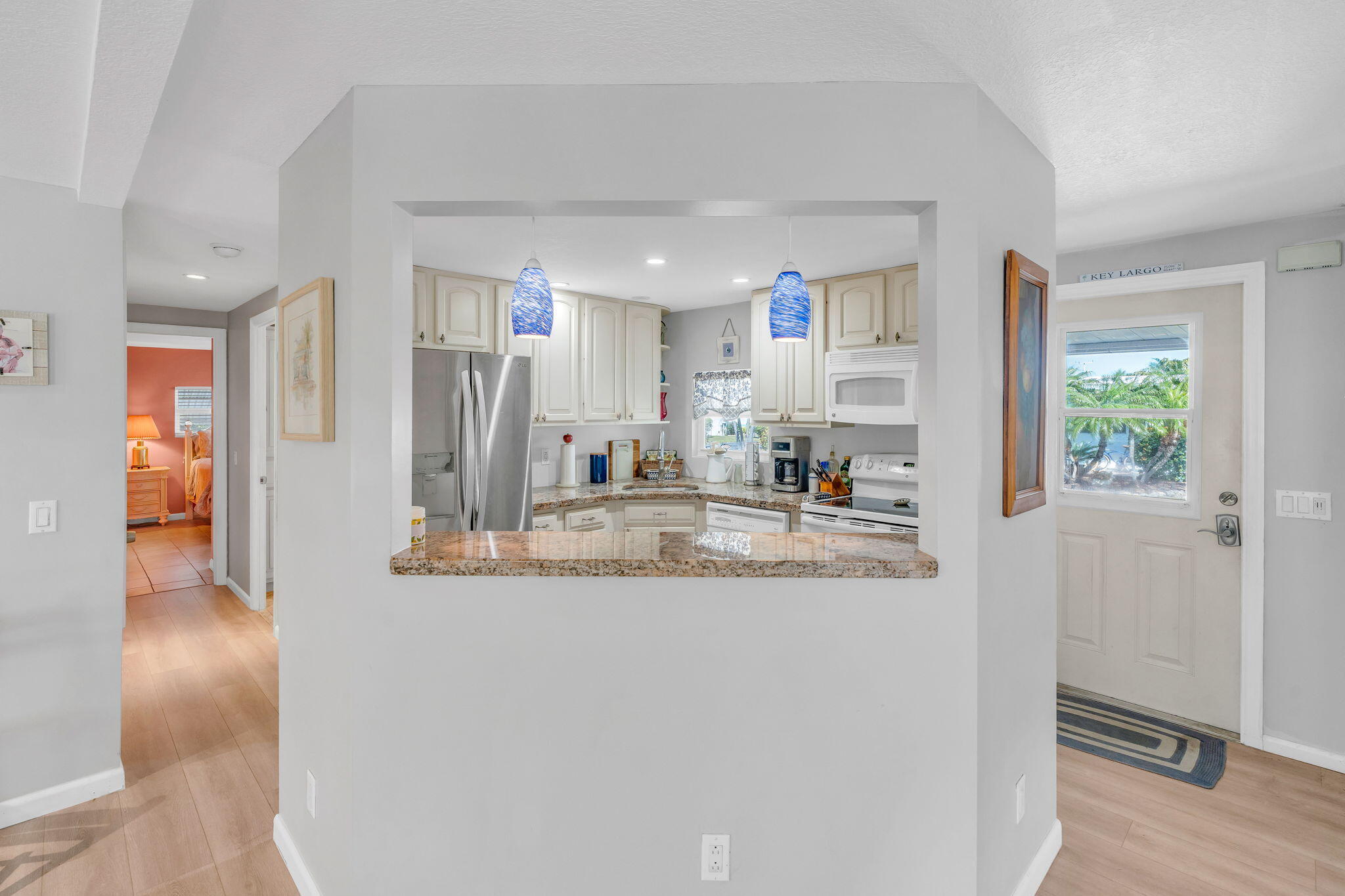 902 South Ruby Drive Key Largo, FL 33037 - Photo 35 of 44 a view of kitchen with stainless steel appliances granite countertop a refrigerator and a sink