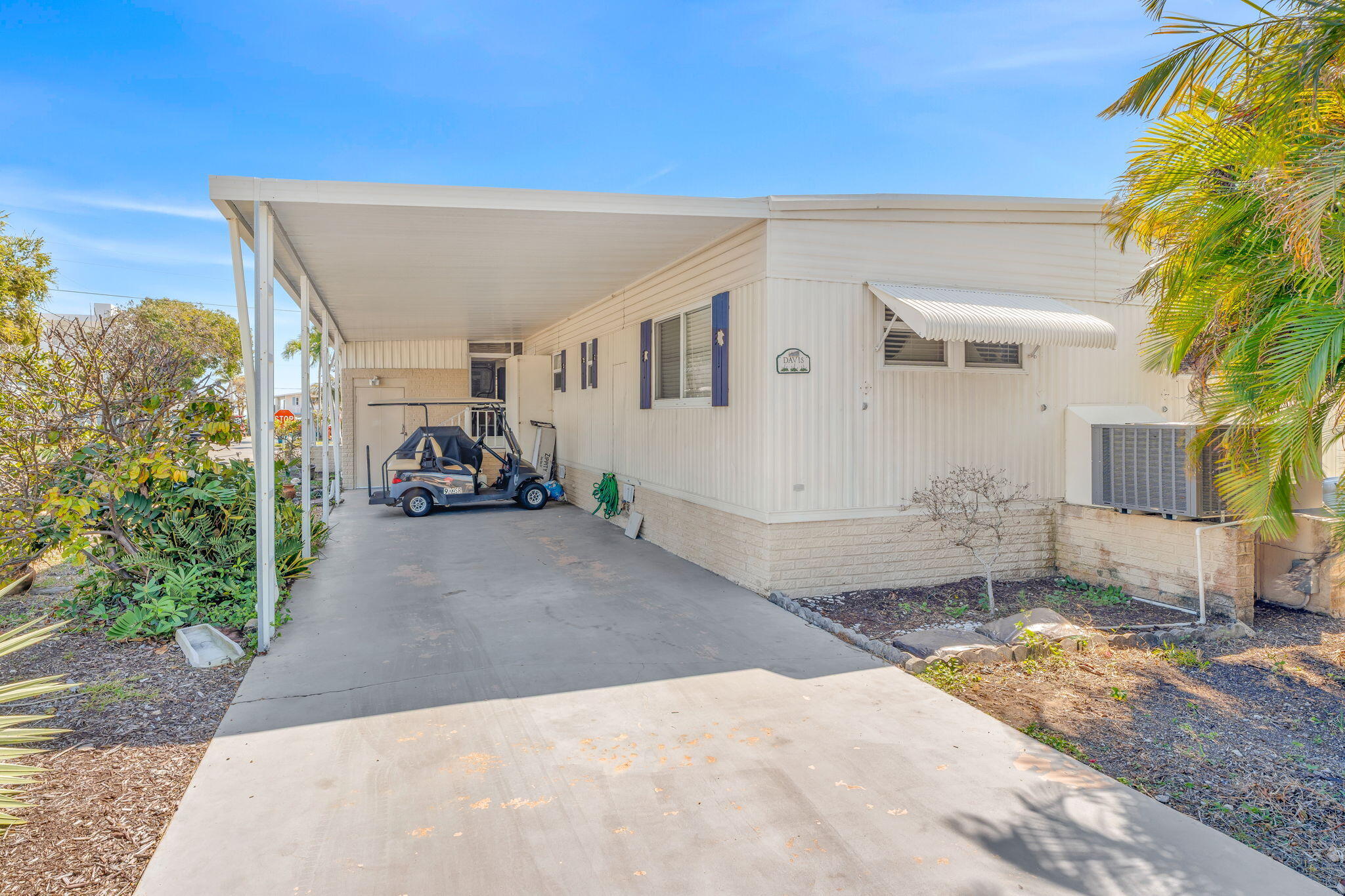 902 South Ruby Drive Key Largo, FL 33037 - Photo 7 of 44 a view of a house with a patio