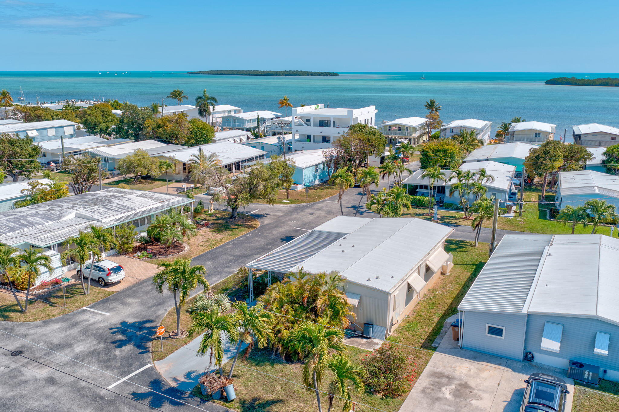 902 South Ruby Drive Key Largo, FL 33037 - Photo 8 of 44 an aerial view of a house with a lake view