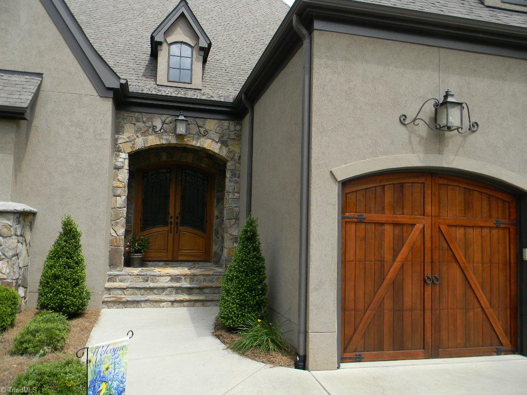 820 Pinebrook School Road Mocksville, NC 27028 - Photo 16 of 28 Lovely stone and hard coat stucco exterior of home.