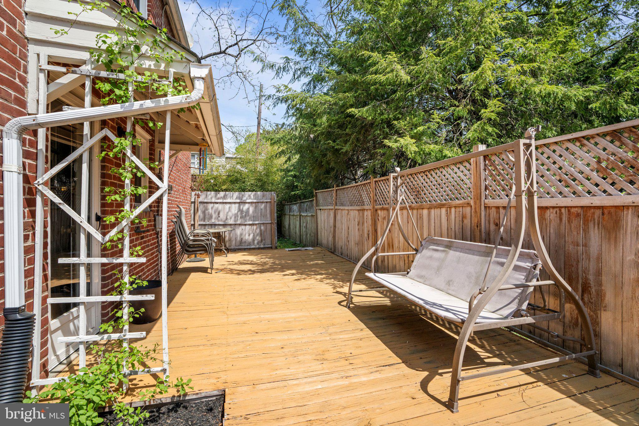 827 Dover Road Wynnewood, PA 19096 - Photo 23 of 23 a backyard of a house with table and chairs