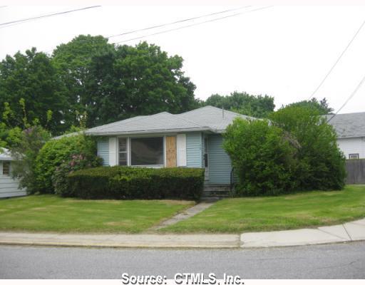 70 Cottage Street Killingly, CT 06239 - Photo 1 of 1 a front view of a house with a yard