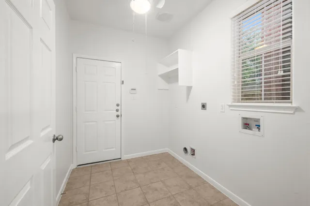 a view of a bathroom with a bathtub