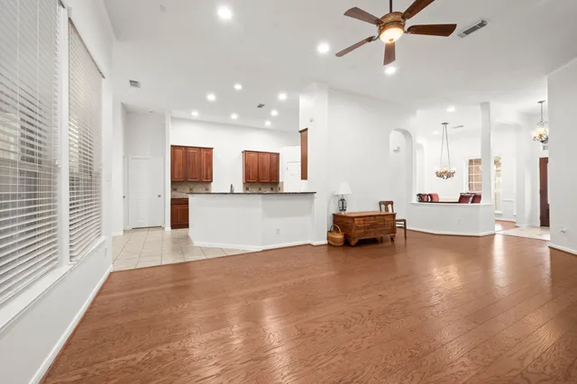 a view of kitchen with sink and window