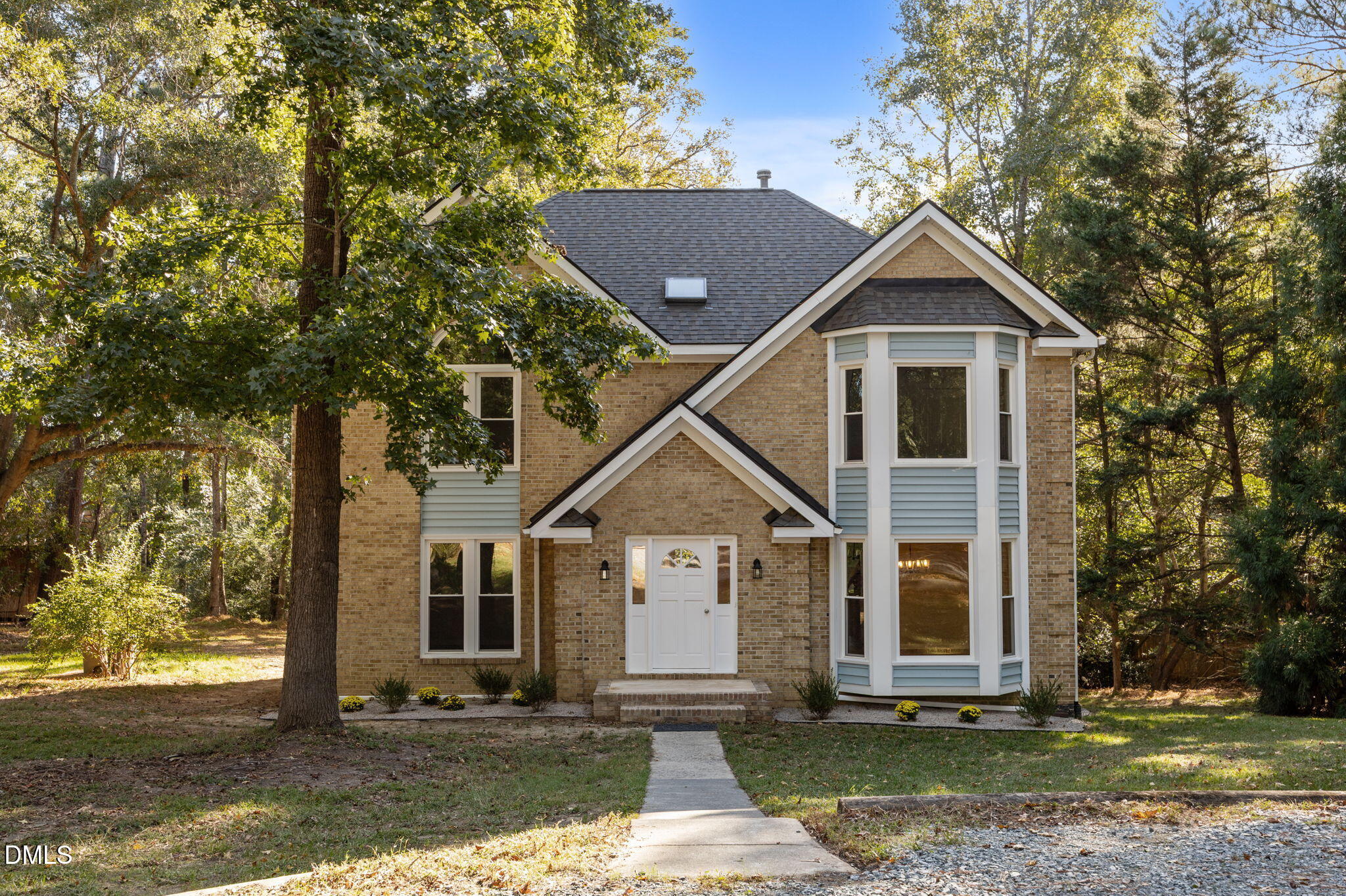729 Wimberly Road Apex, NC 27523 - Photo 1 of 61 a front view of a house with a yard