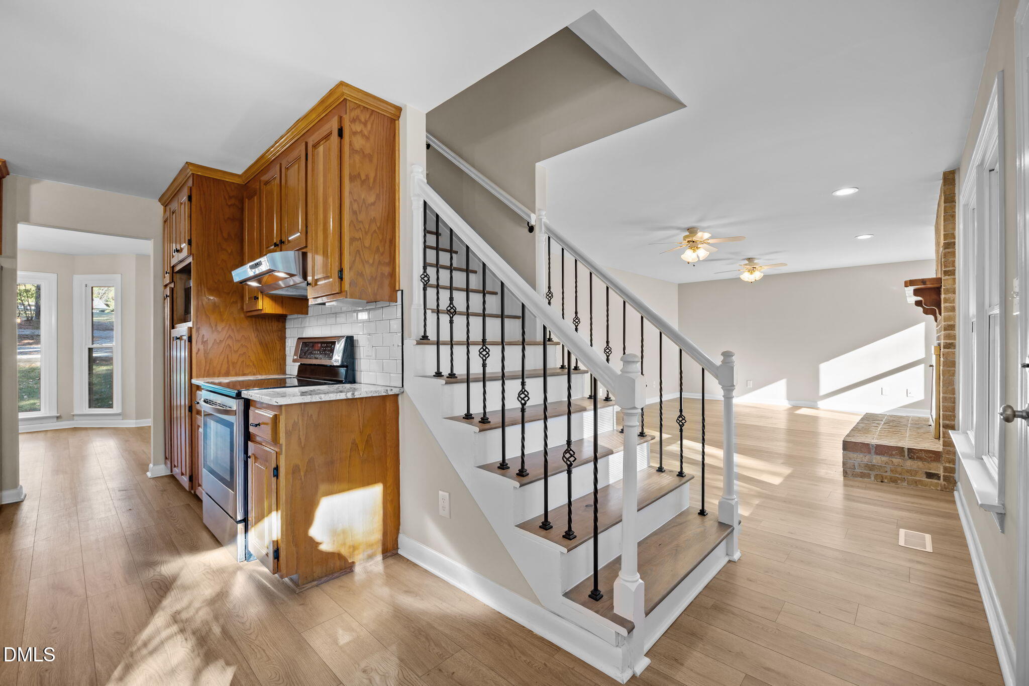 729 Wimberly Road Apex, NC 27523 - Photo 19 of 61 a view of entryway and hall with wooden floor