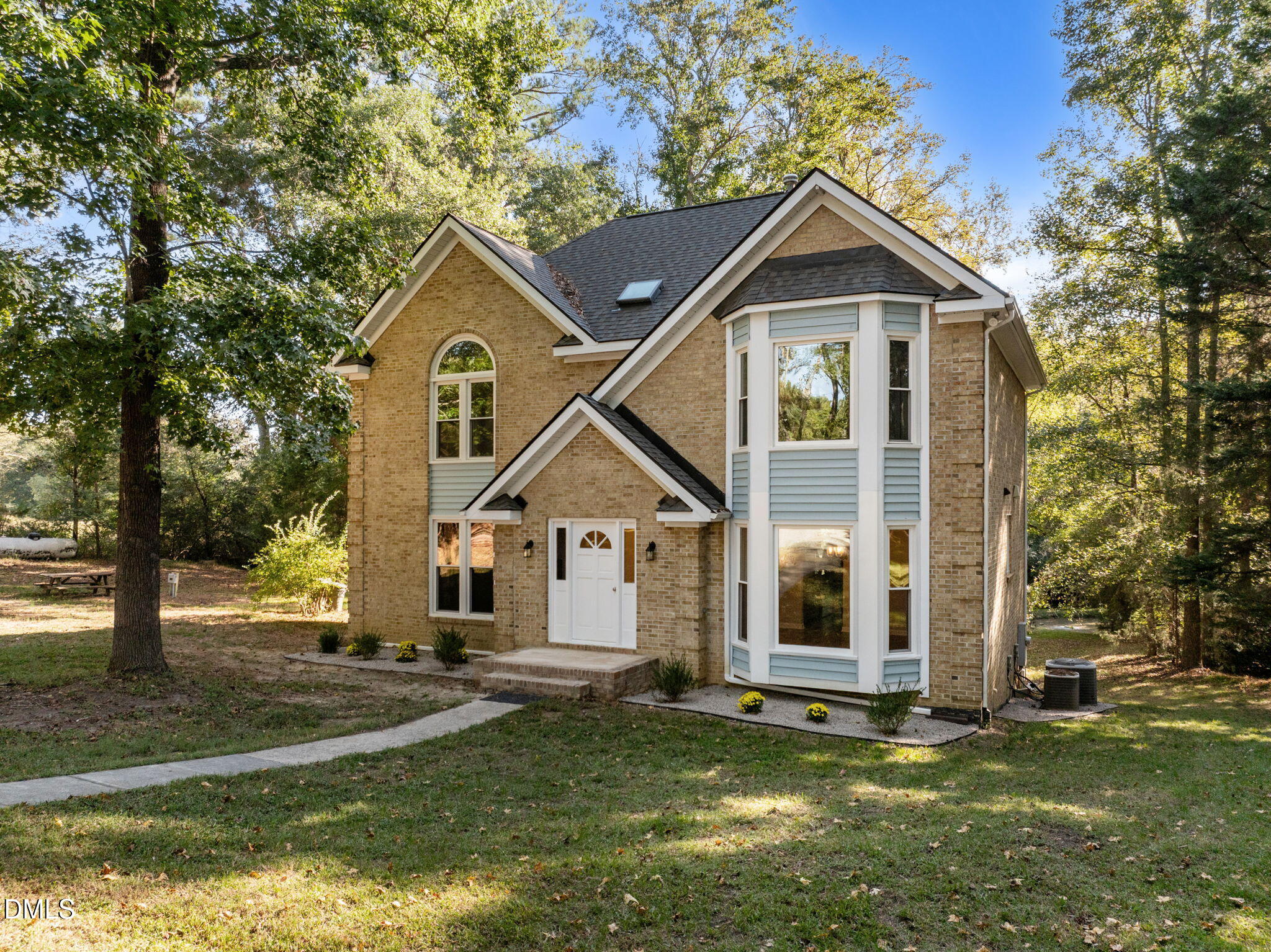 729 Wimberly Road Apex, NC 27523 - Photo 3 of 61 a front view of a house with a yard