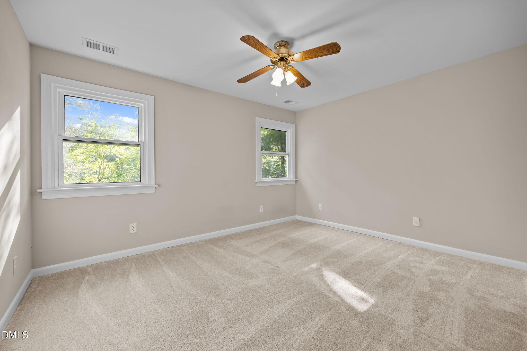 729 Wimberly Road Apex, NC 27523 - Photo 33 of 61 a view of an empty room with a window