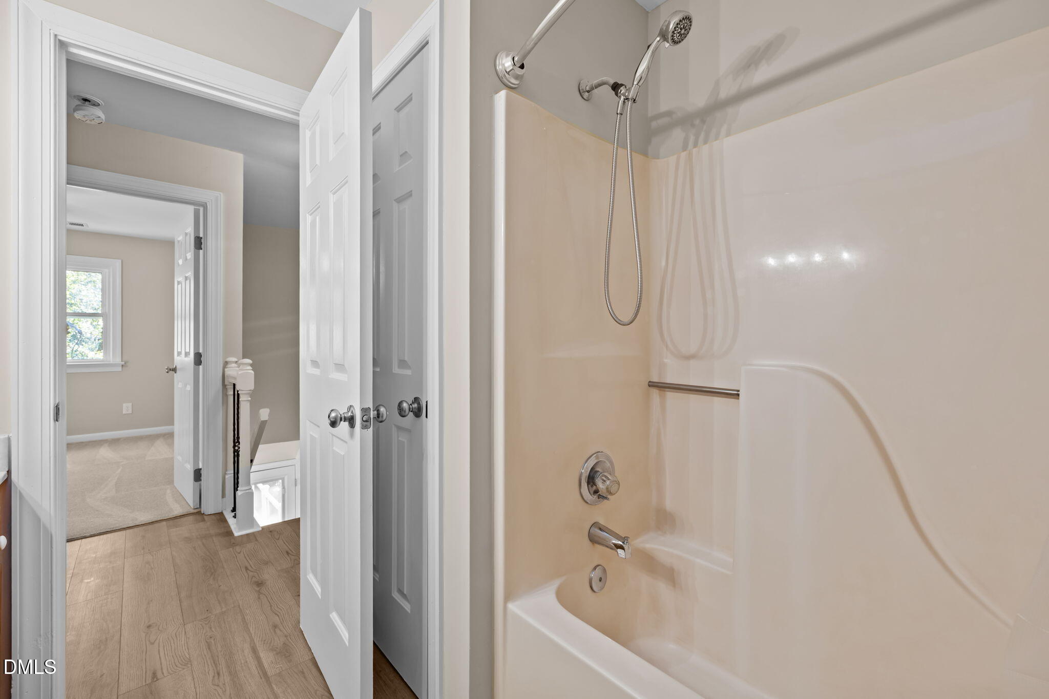 729 Wimberly Road Apex, NC 27523 - Photo 35 of 61 a bathroom with a bathtub and a shower