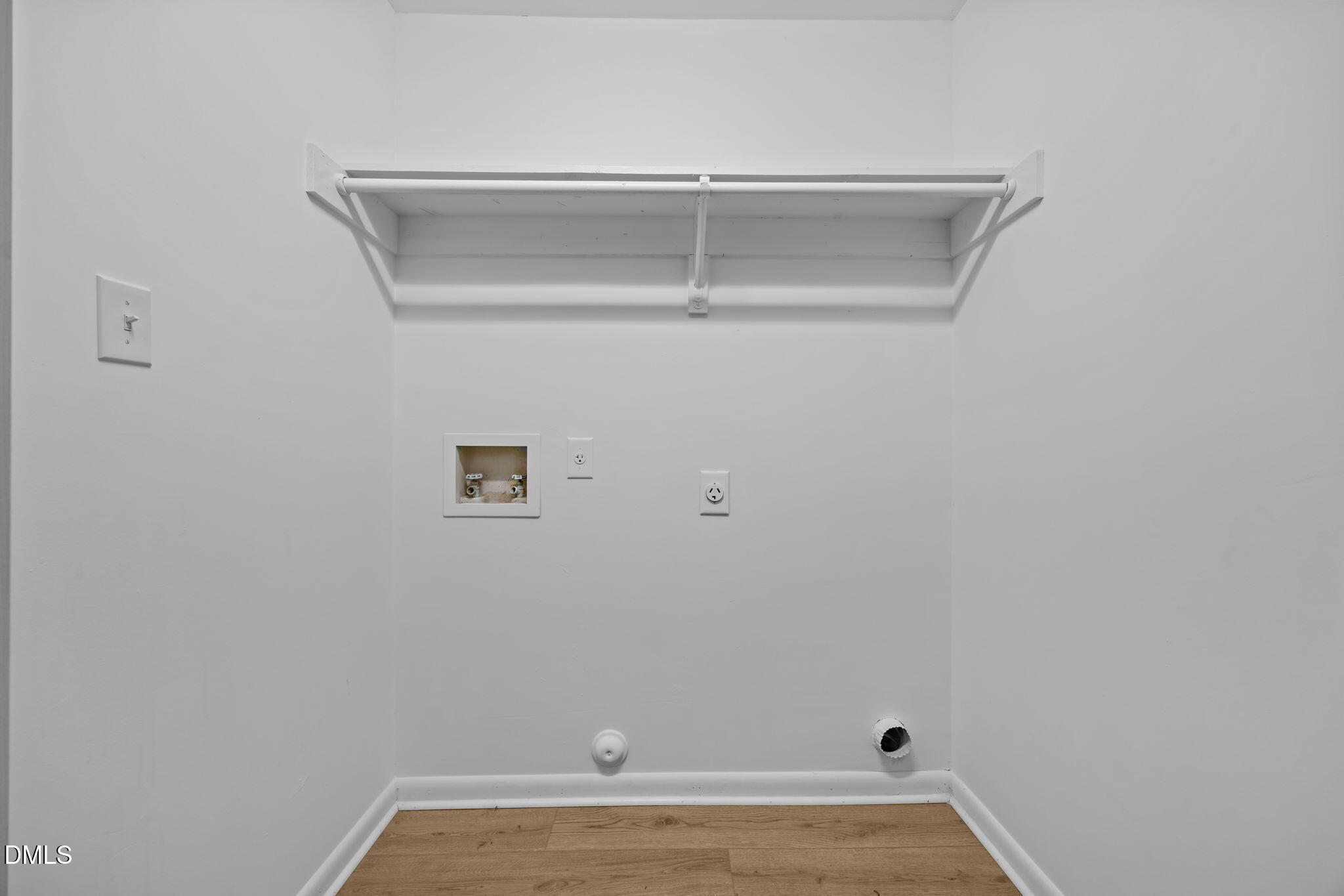 729 Wimberly Road Apex, NC 27523 - Photo 36 of 61 a view of small space with racks on the wall