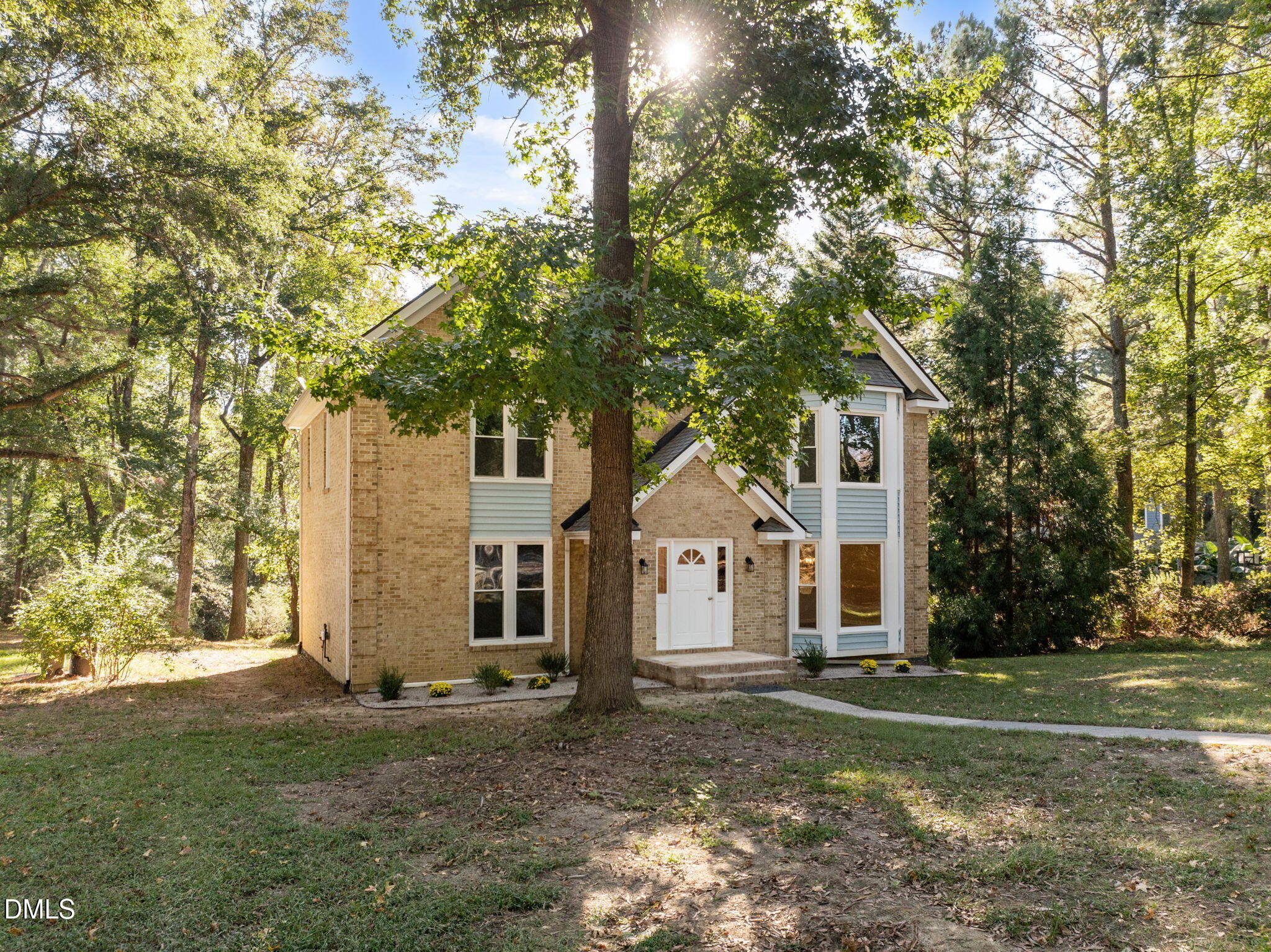 729 Wimberly Road Apex, NC 27523 - Photo 42 of 61 a front view of a house with a yard