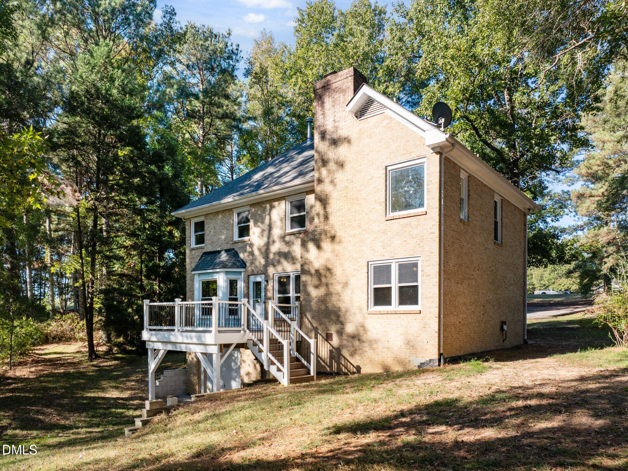 729 Wimberly Road Apex, NC 27523 - Photo 46 of 61 a view of a house with a yard