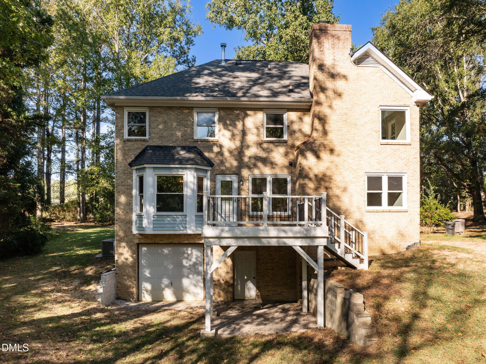 729 Wimberly Road Apex, NC 27523 - Photo 49 of 61 a front view of a house with a yard