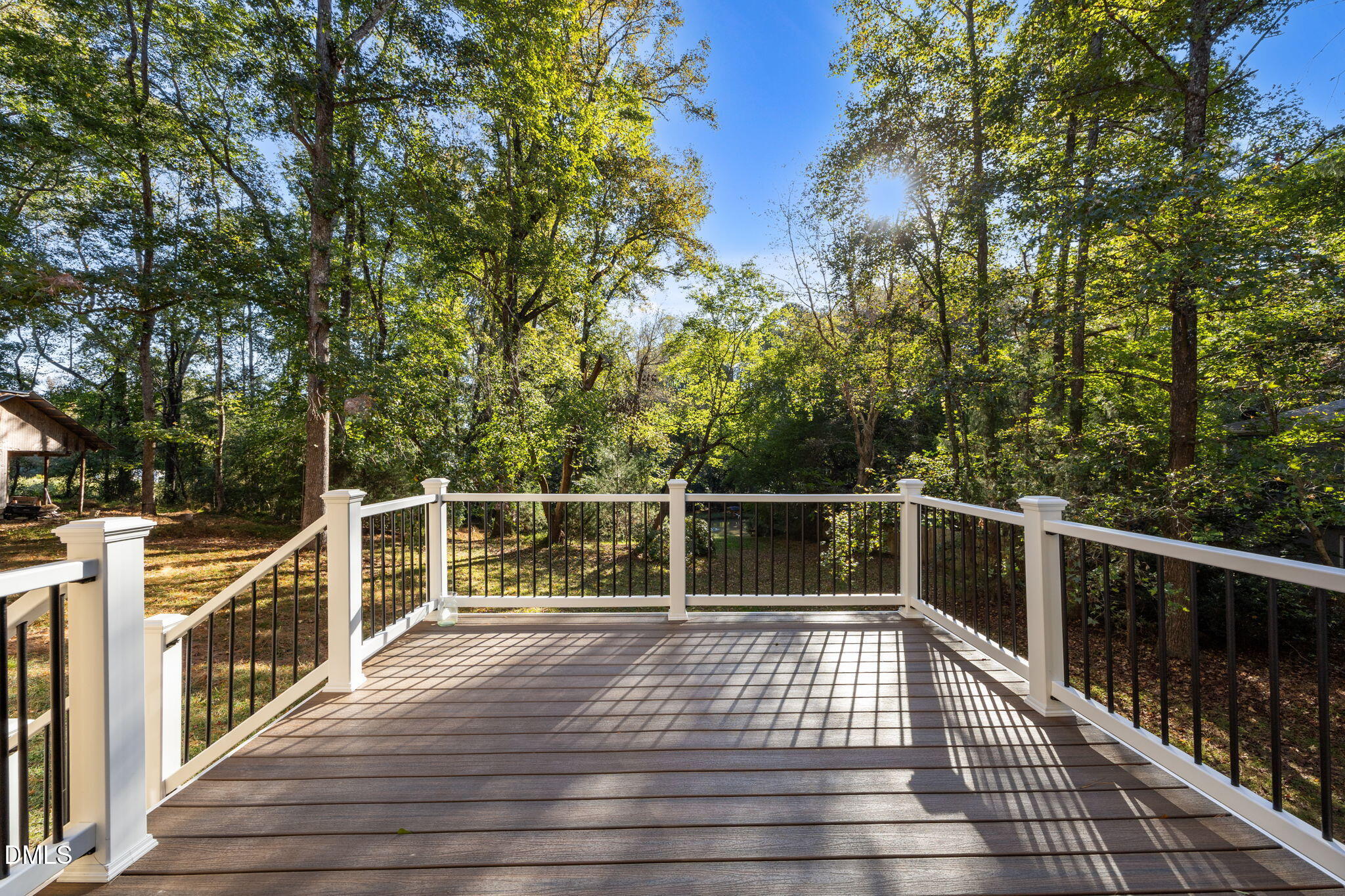 729 Wimberly Road Apex, NC 27523 - Photo 53 of 61 a view of balcony with wooden floor and fence