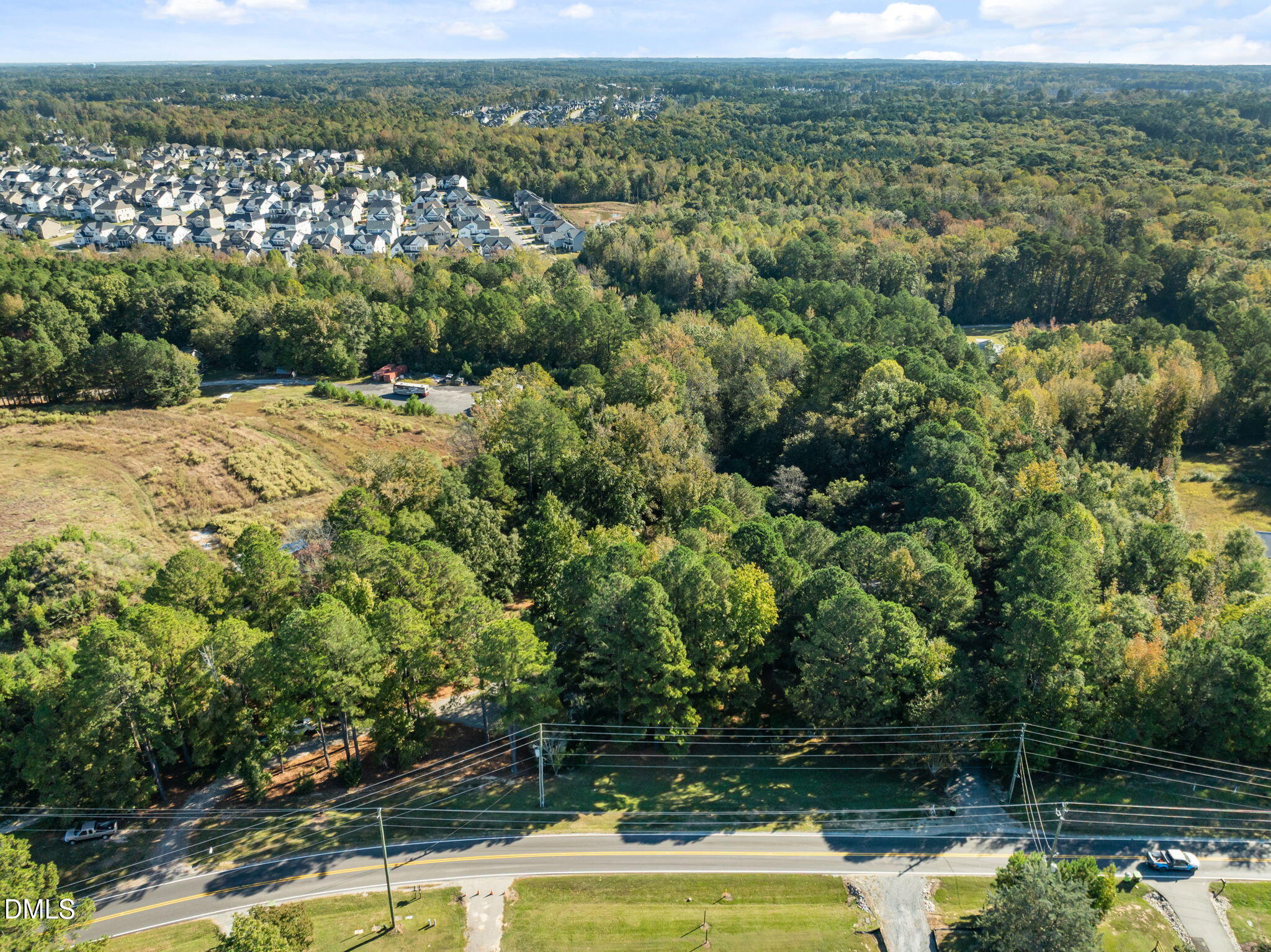 729 Wimberly Road Apex, NC 27523 - Photo 58 of 61 a view of a lake with a mountain
